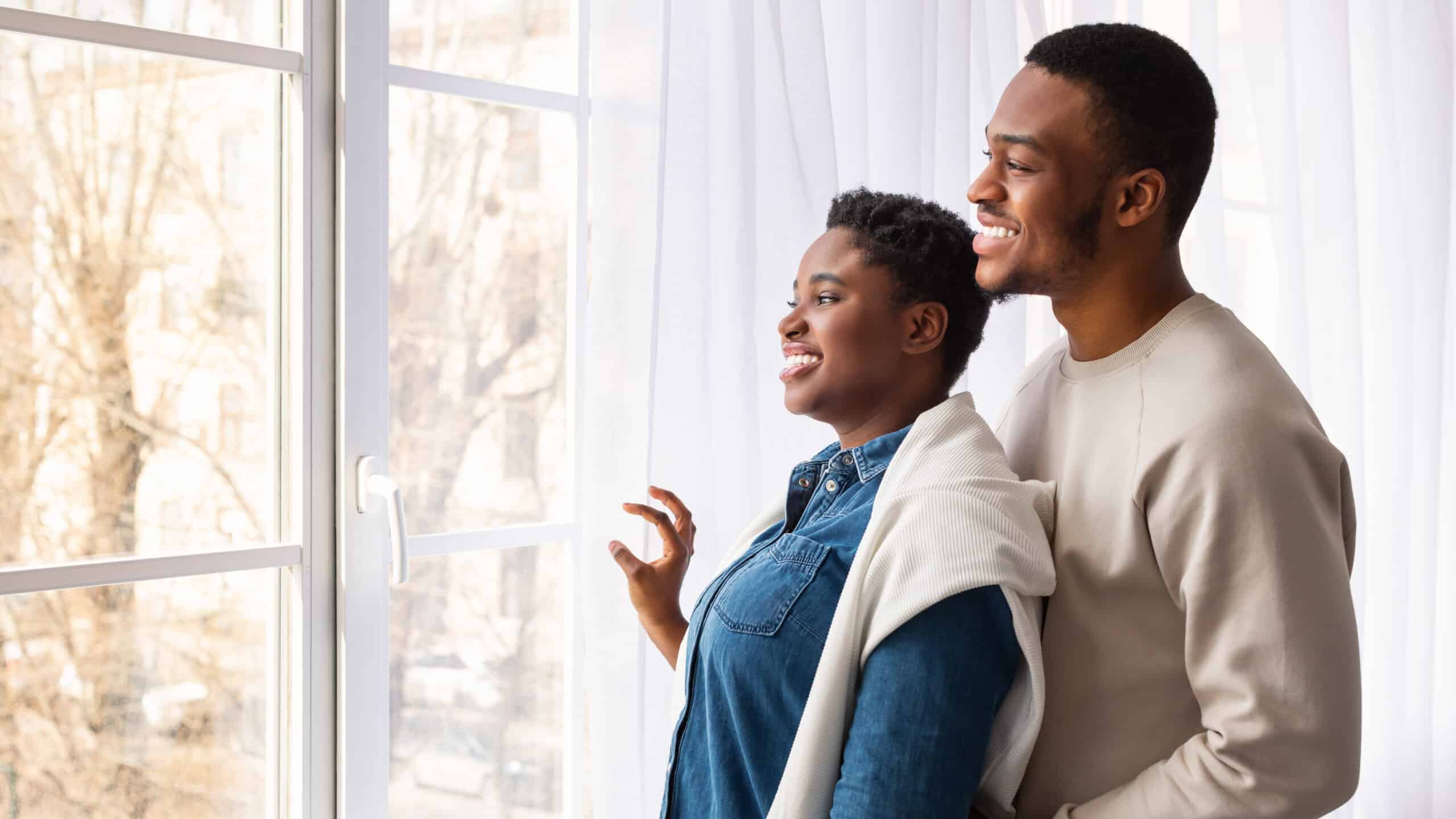 couple looking out the window